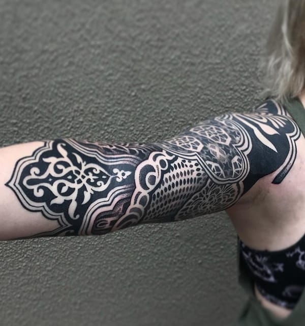 Upper Arm Black Ink Tribal Tattoo