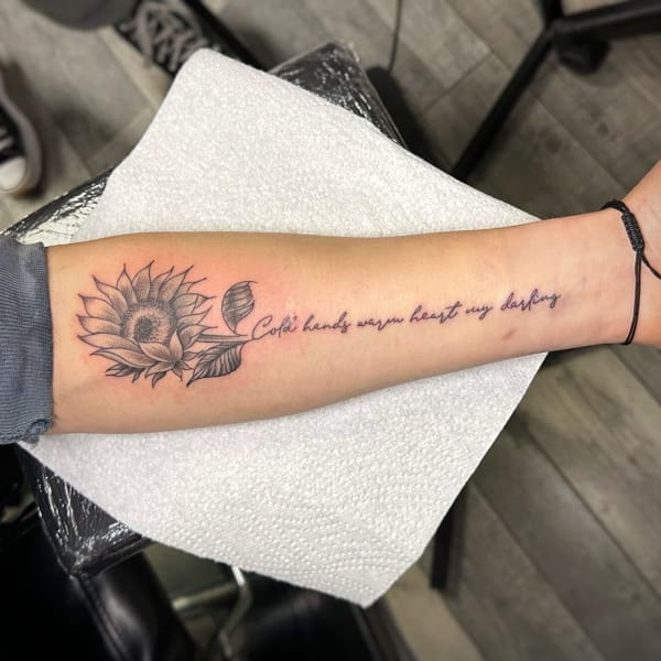 Half Sleeve Quote Tattoo with a Sunflower
