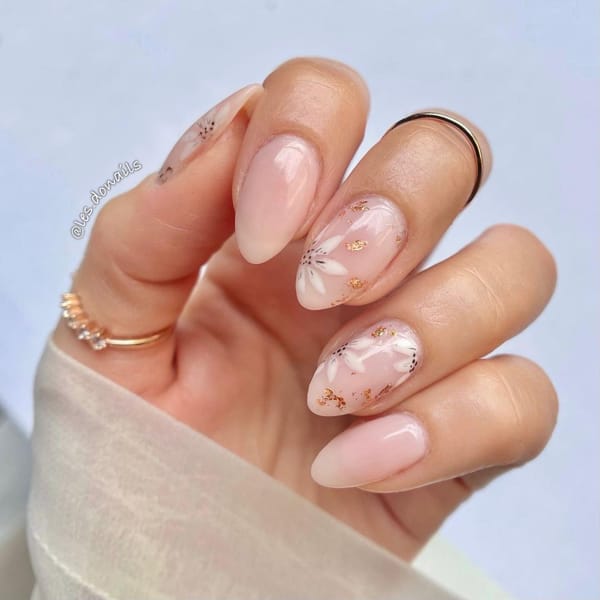 Sheer White Nails with Delicate Floral Motif